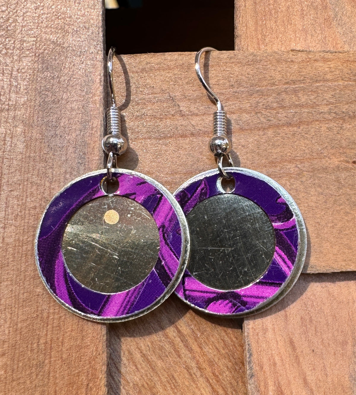 Purple and magenta marbled halo circle drop earrings with a brushed silver center disk